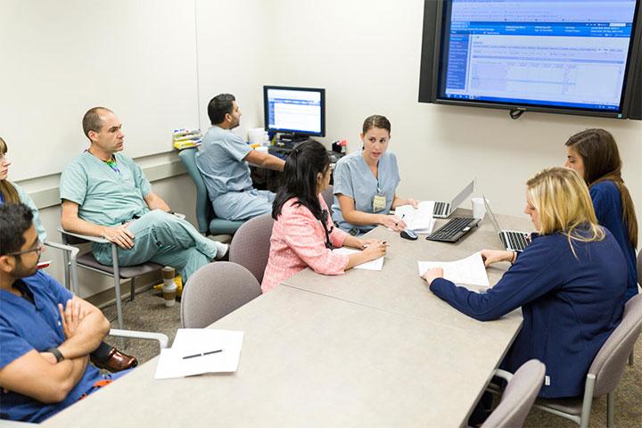Renal Transplant fellows and faculty collaborating a conference room at Mayo Clinic in Phoenix, Arizona.