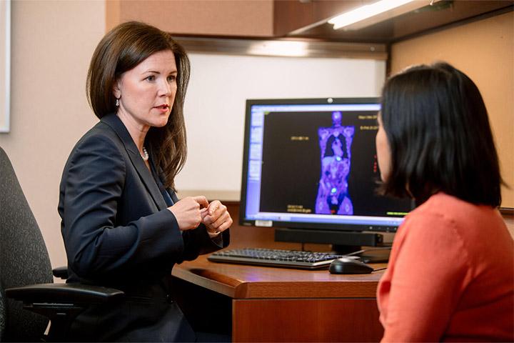 Thoracic Surgery resident speaks with a patient at Mayo Clinic in Rochester, Minnesota.
