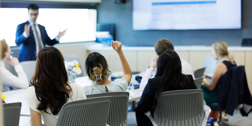 An instructor at Mayo Clinic presents to a classroom