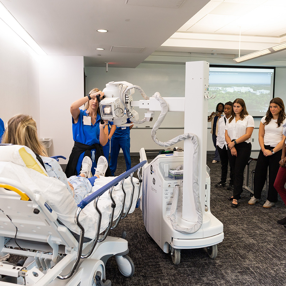 Participants watch a demonstration at the Radiology Imaging Open House at Mayo Clinic in Rochester, Minnesota.